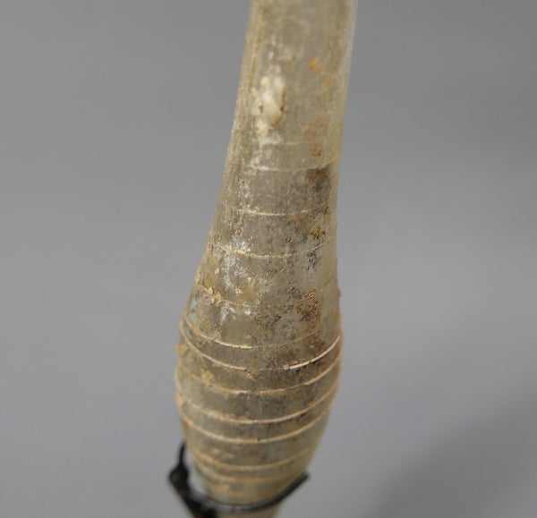 Fusiform flask.