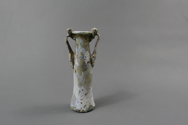 Bottle with two handles.