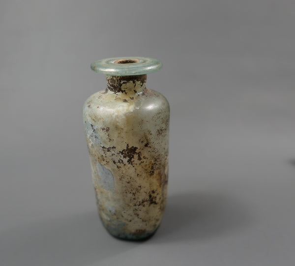 Bouteille cylindrique.