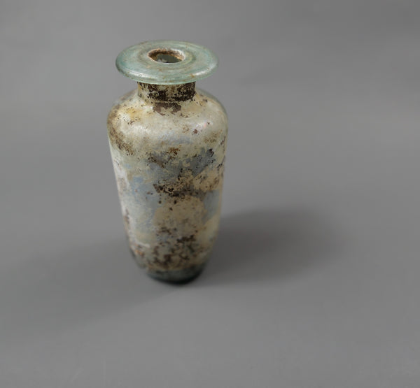 Bouteille cylindrique.