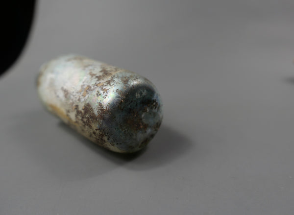 Bouteille cylindrique.