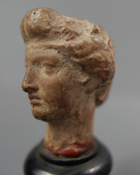 Tête de statuette.