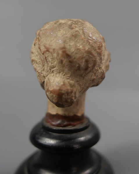 Tête de statuette.