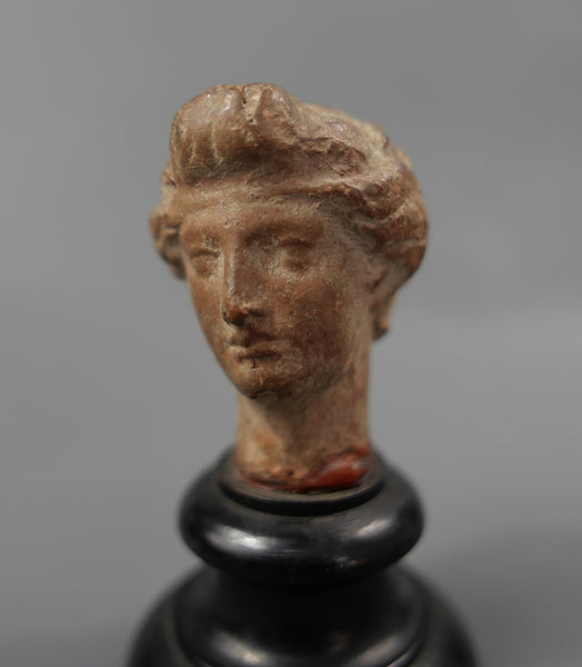 Tête de statuette.