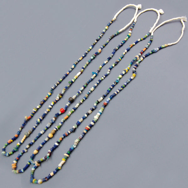 Glass necklace.