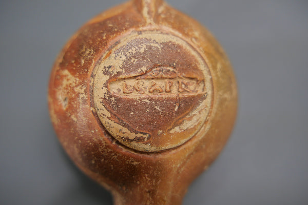 Lampe à huile.