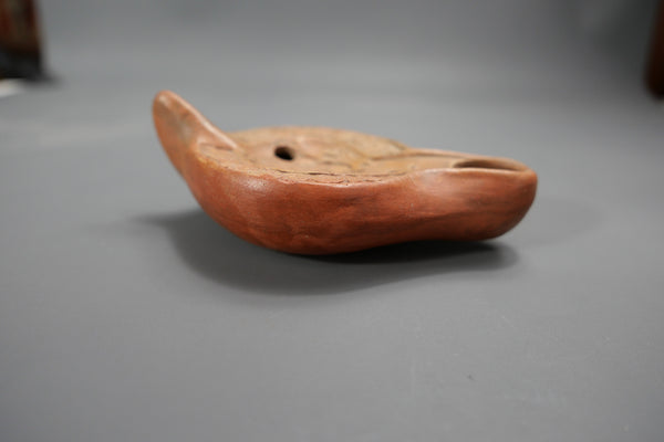 Lampe à huile.