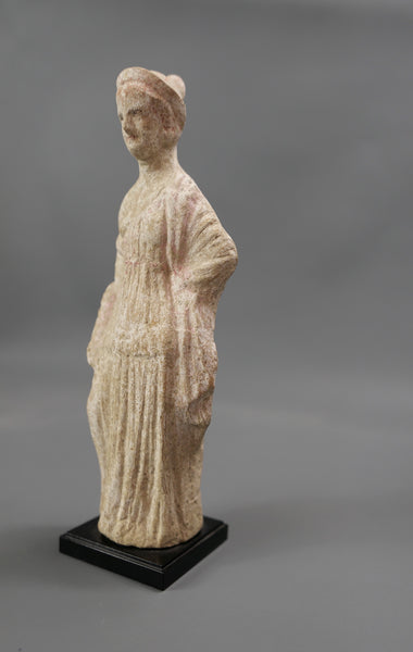Female statuette.