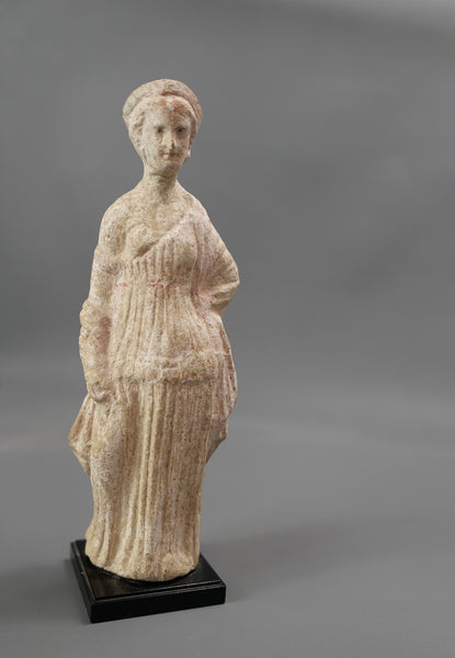 Female statuette.