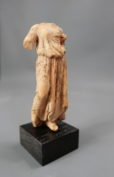 Female statuette.